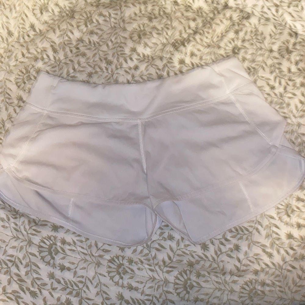 Size 6 lululemon white speed up shorts (liner was removed from inside)
